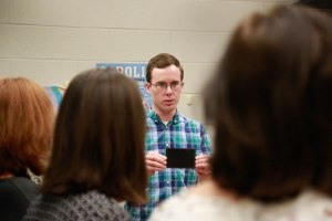 Lab member discusses samples.