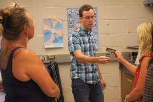 Devon trades samples.