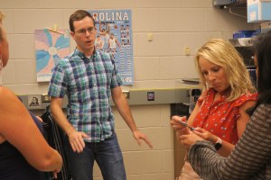 Devon passes around a sample.