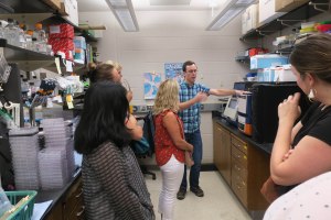 Devon discusses lab technology.