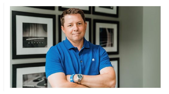 John MacLeod Poses with a Smile